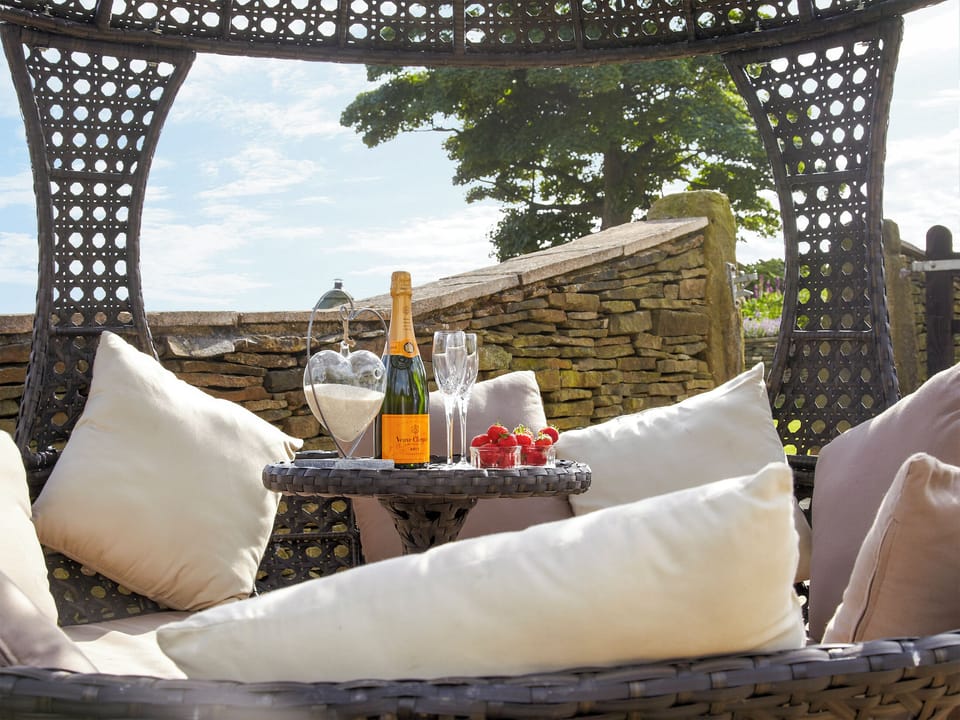 Shared patio with garden furniture | Smallshaw Cottages, Millhouse Green, near Penistone