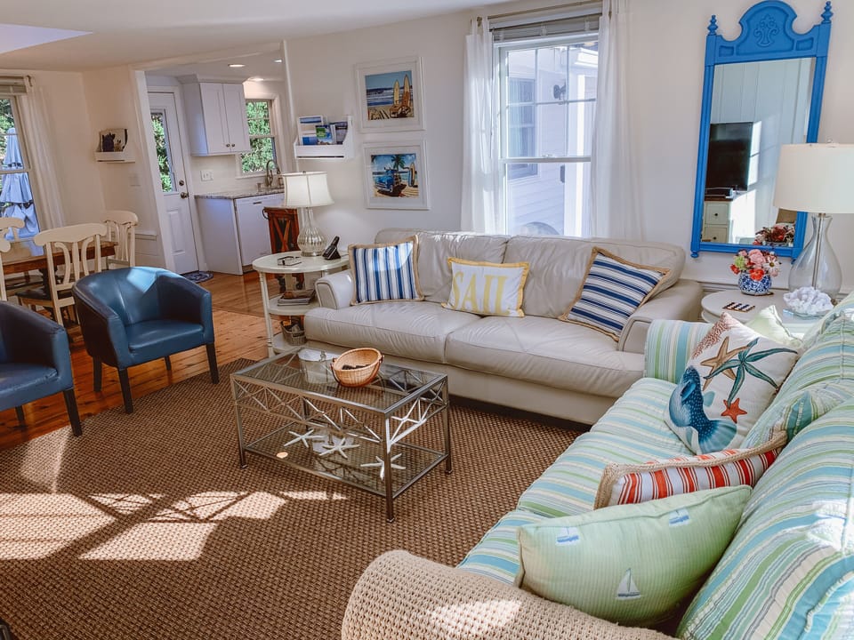 Inviting Coastal Ambiance, Skylights, and Wood Floors Throughout