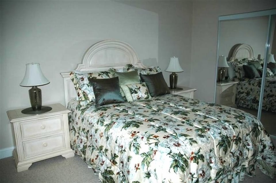This bedroom looks to the west and the intercoastal waterway and has a TV.