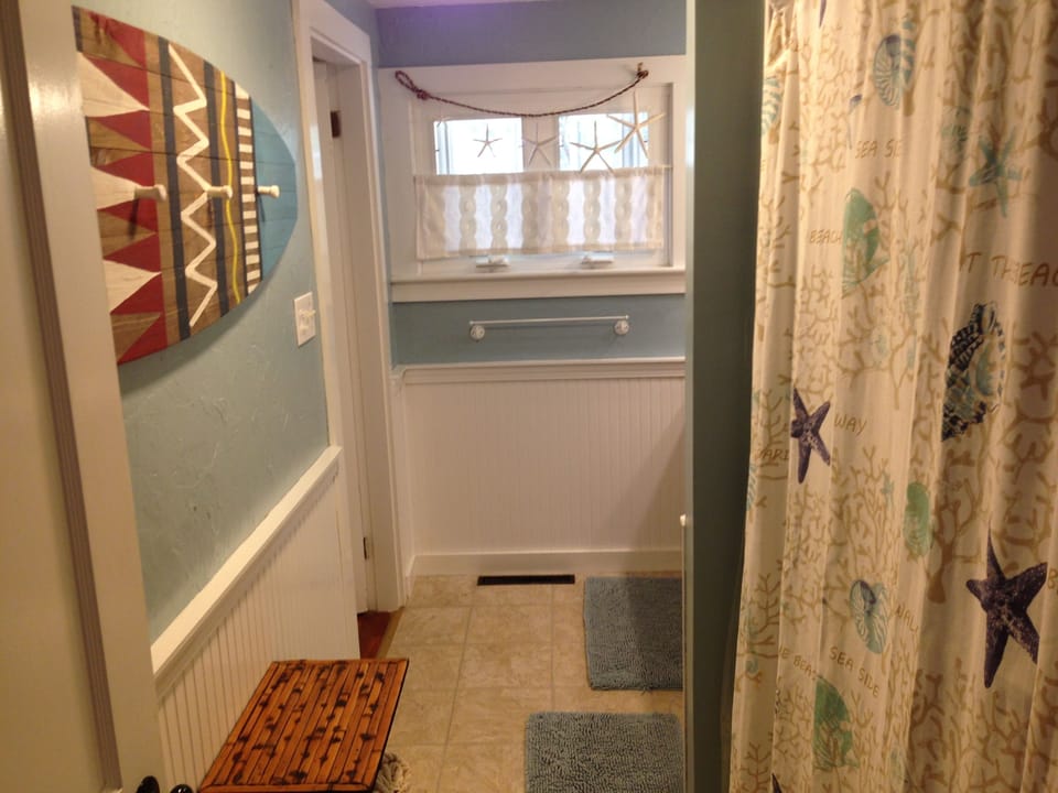 Second bath full shower and tub. Shared by 2nd and 3rd bedrooms