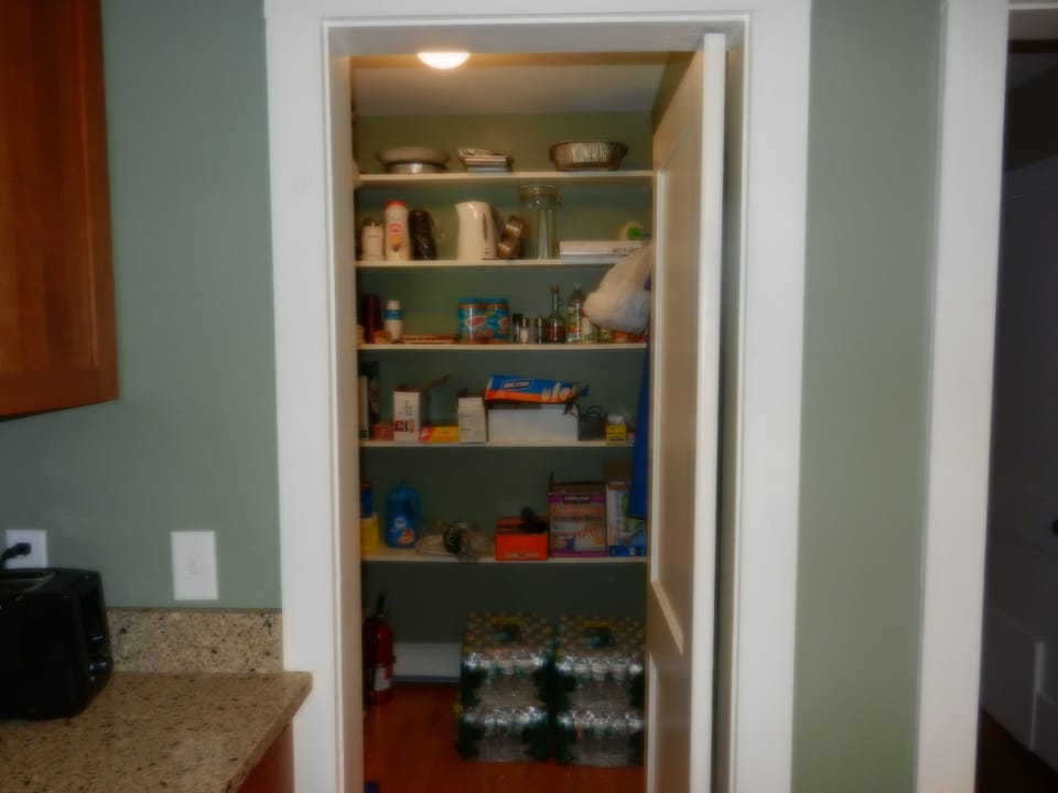 Kitchen walk-in pantry to store your food and supplies.