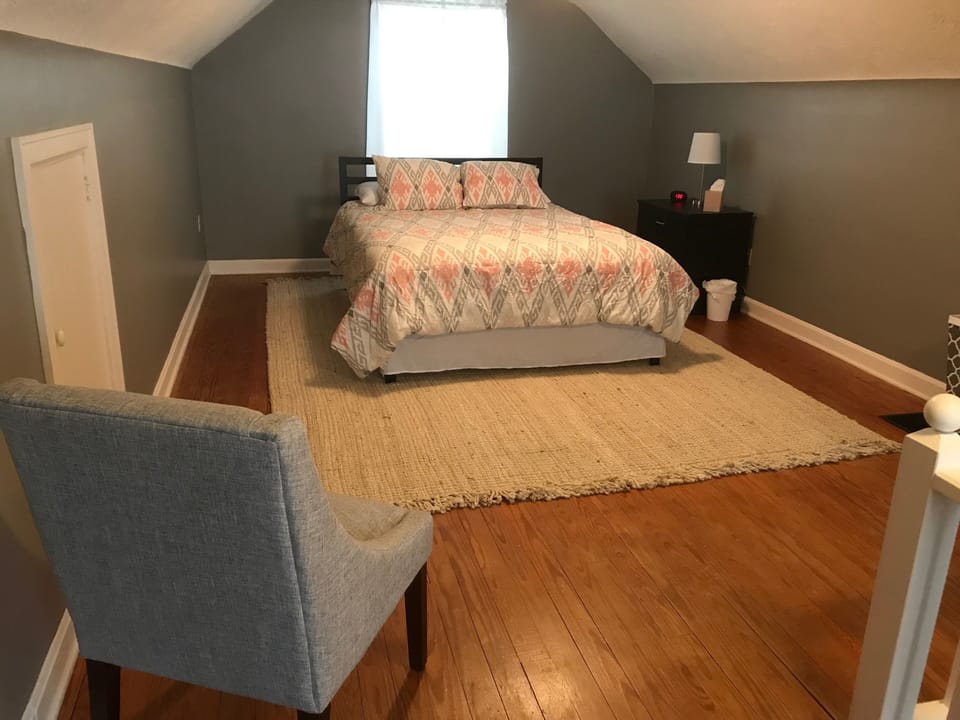 Upstairs bedroom with queen sized bed.
