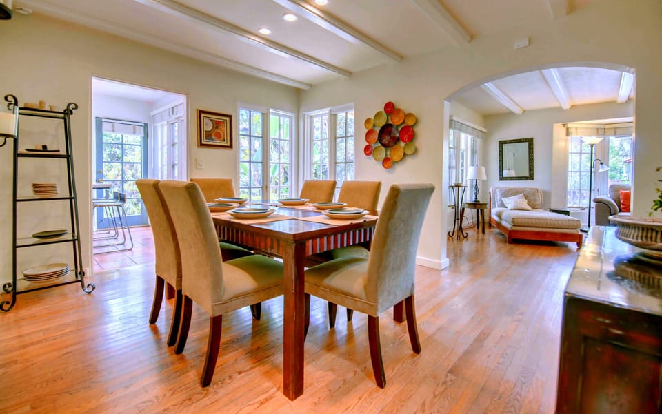 Bright & Airy Dining Room has Kitchen Access and Views to the Private Garden