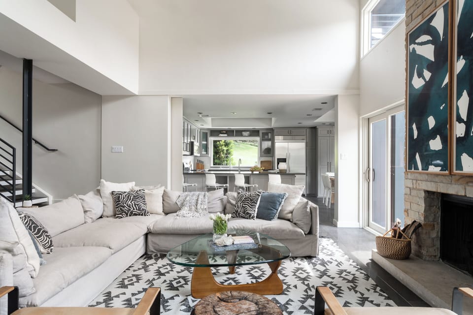 Living room with views into kitchen. 