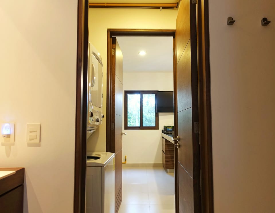 Access from kitchen is convenient if someone is sleeping in the bedroom.