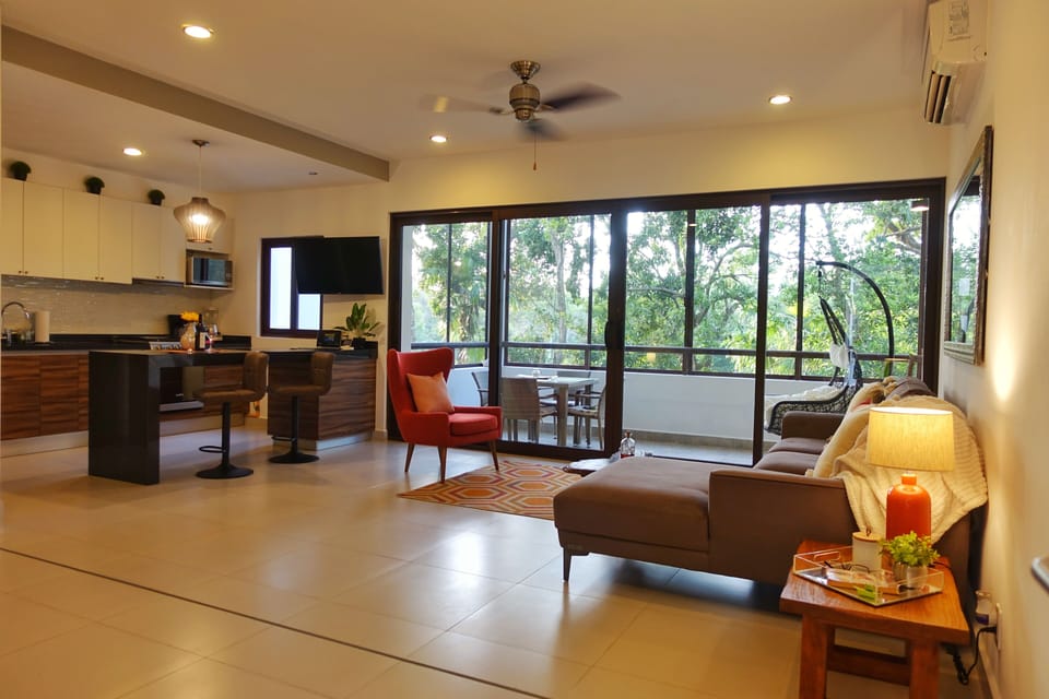 Spacious Living area and Kitchen with French-Door entrance to the patio.