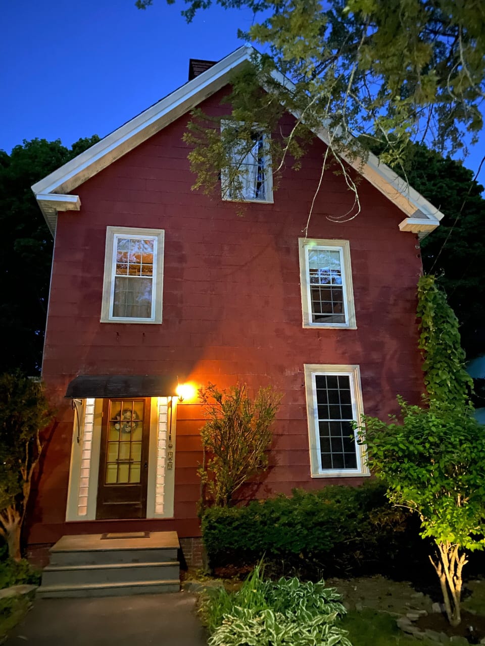 The Big Red House at twilight.