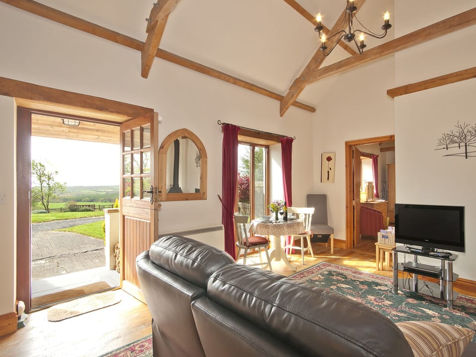 Cosy living area with wood burner | Timberway, Okehampton