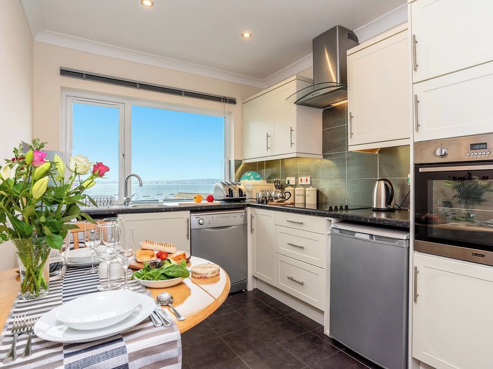 Charming kitchen and dining area | 9 Dolphin Court, Brixham