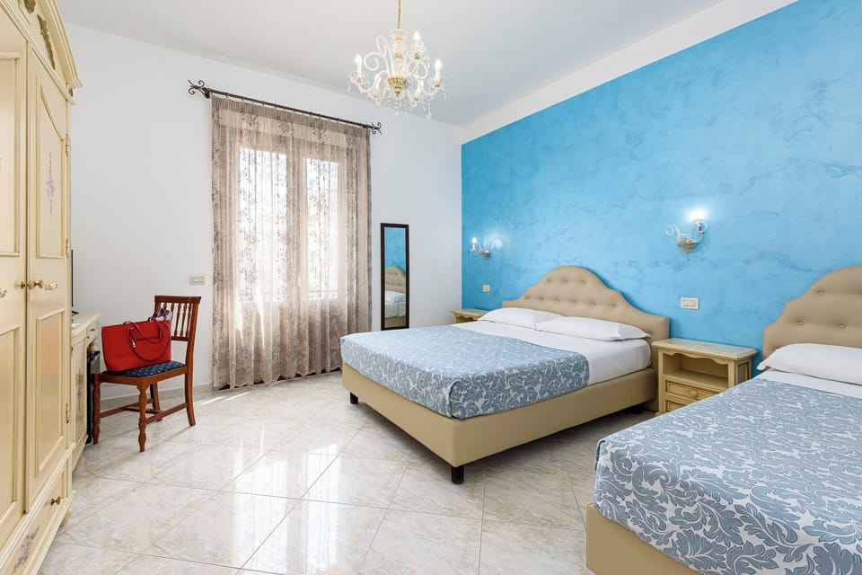 Deluxe Triple Room | Premium bedding, minibar, in-room safe, desk