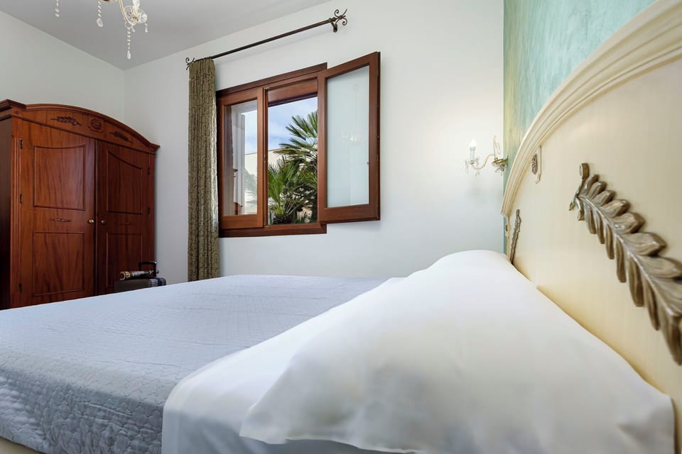 Economy Double Room, Ground Floor | Premium bedding, minibar, in-room safe, desk