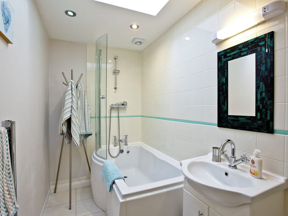 Bathroom with shower over bath | Little Gem, Weymouth