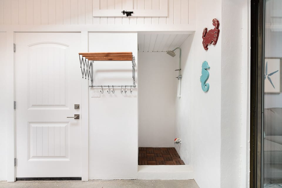 Outdoor shower in the 3 season room