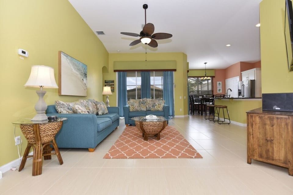 Open-concept living area with stylish furniture and natural light.