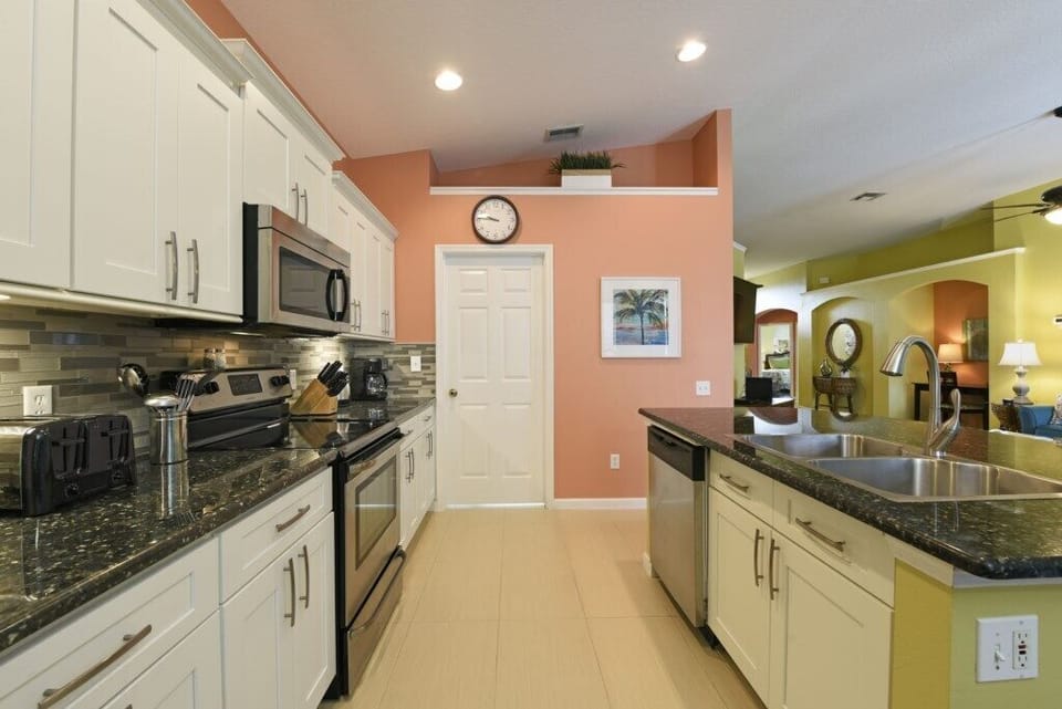 Spacious kitchen with ample counter space and easy flow for meal prep.