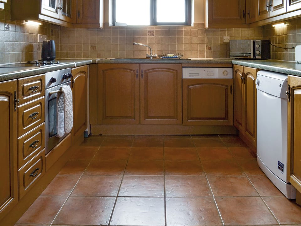 Well-equipped fitted kitchen | Baileys Barn - Moor Farm Stable Cottages, Foxley, near Fakenham