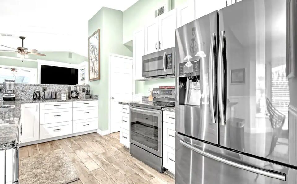 Stainless steel appliances with all the utensils to cook a delicious meal