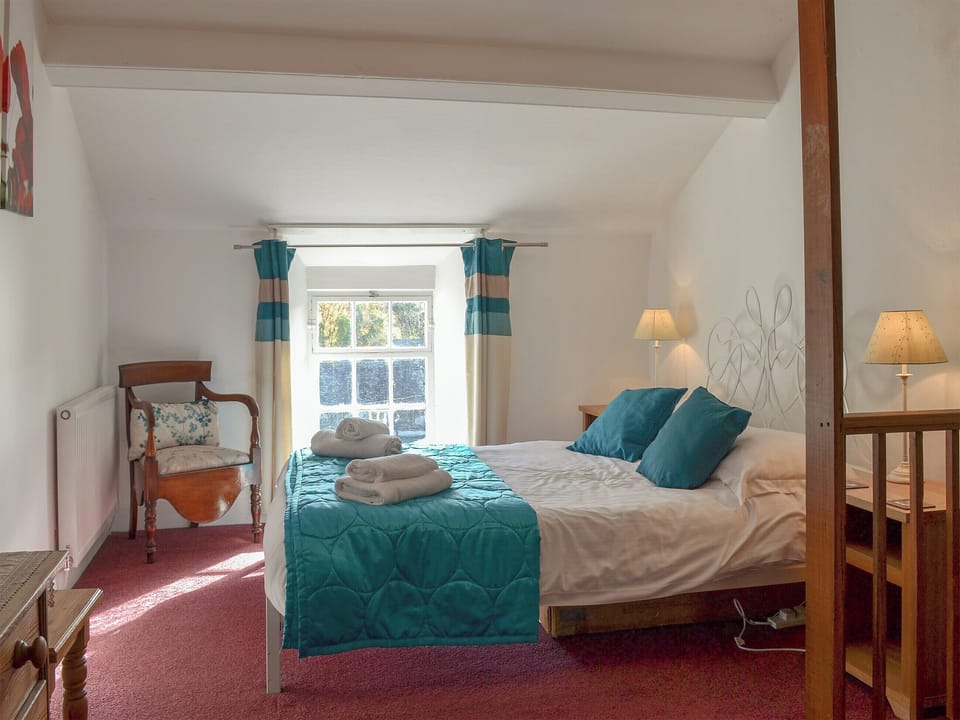 Comfortable bedroom with a double and single bed | Cosy Nook, Ambleside