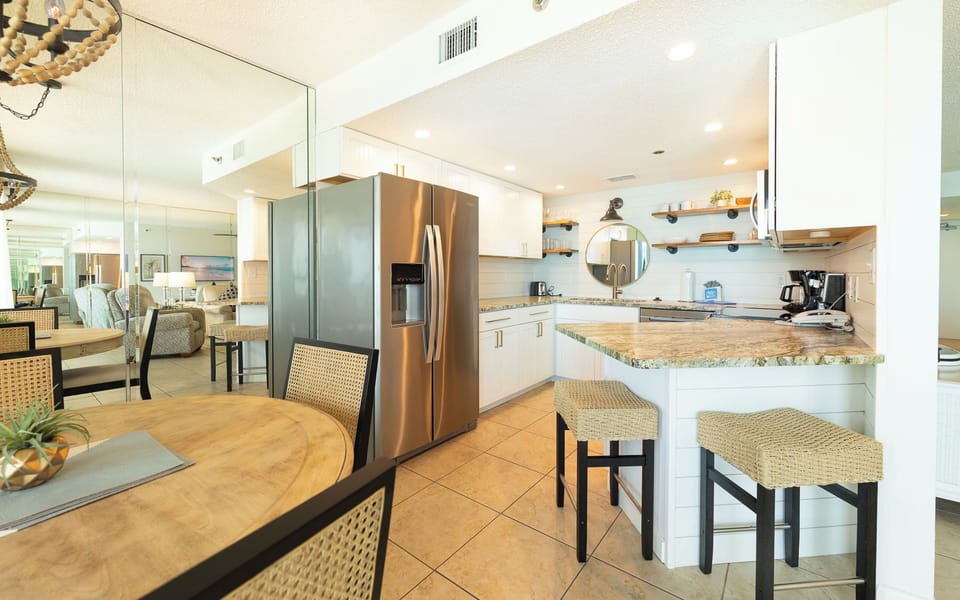 Experience delightful moments in the kitchen as you prepare snacks while enjoying the vibrant vibe of your vacation