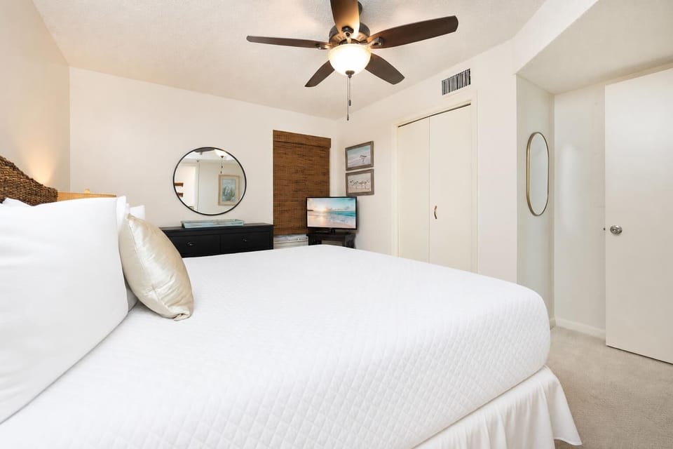 Experience restful nights in a soft king bed, surrounded by personal touches and inviting decor