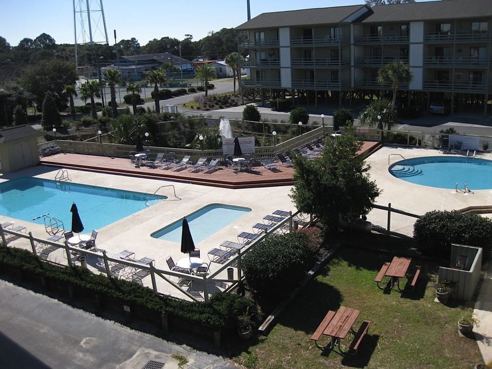 Beach or Pools??  3 pools, turtle pond, grills- gas and charcoal.  Enjoy