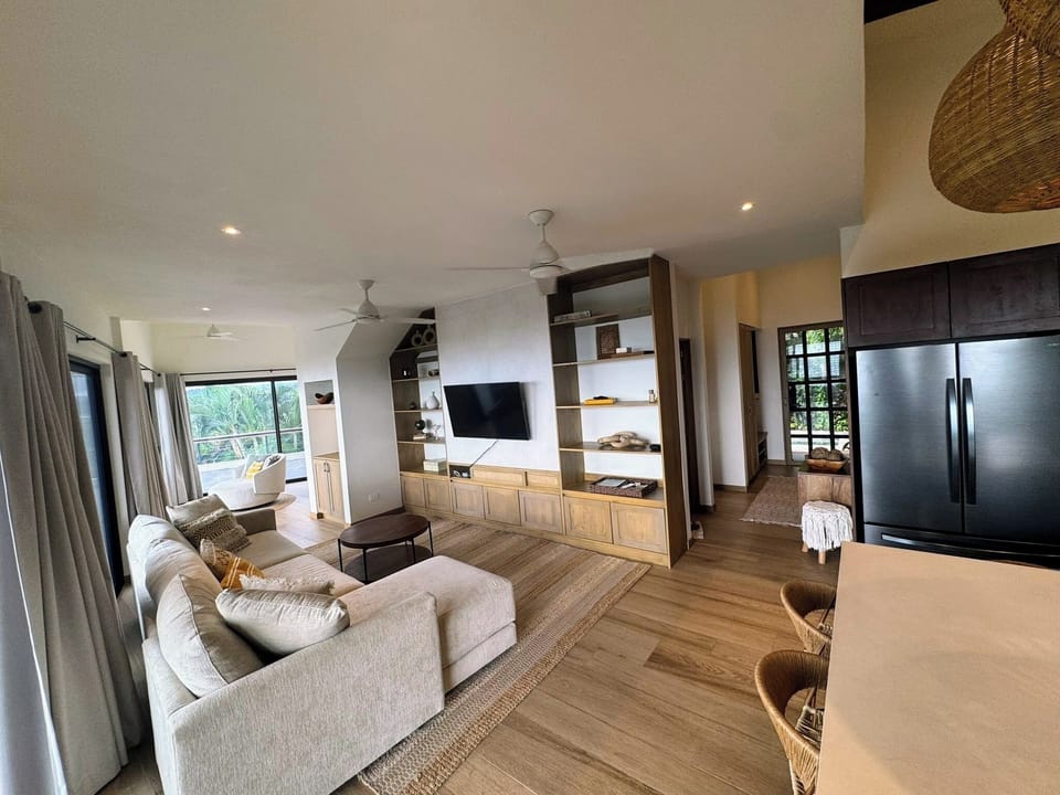 Enter from the patio into the kitchen/living space 