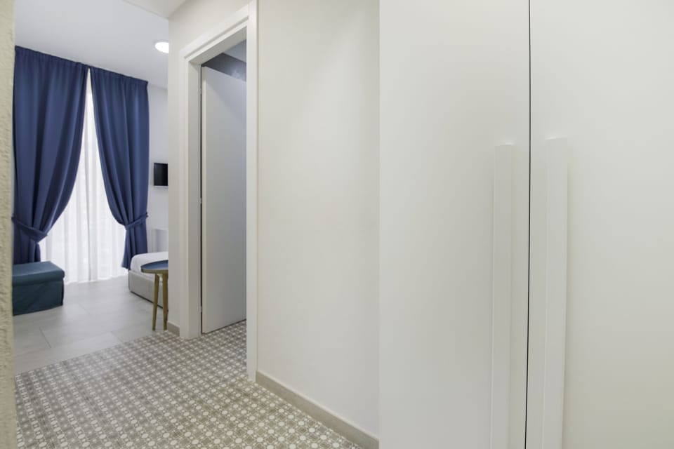 Superior Triple Room | Premium bedding, minibar, desk, laptop workspace