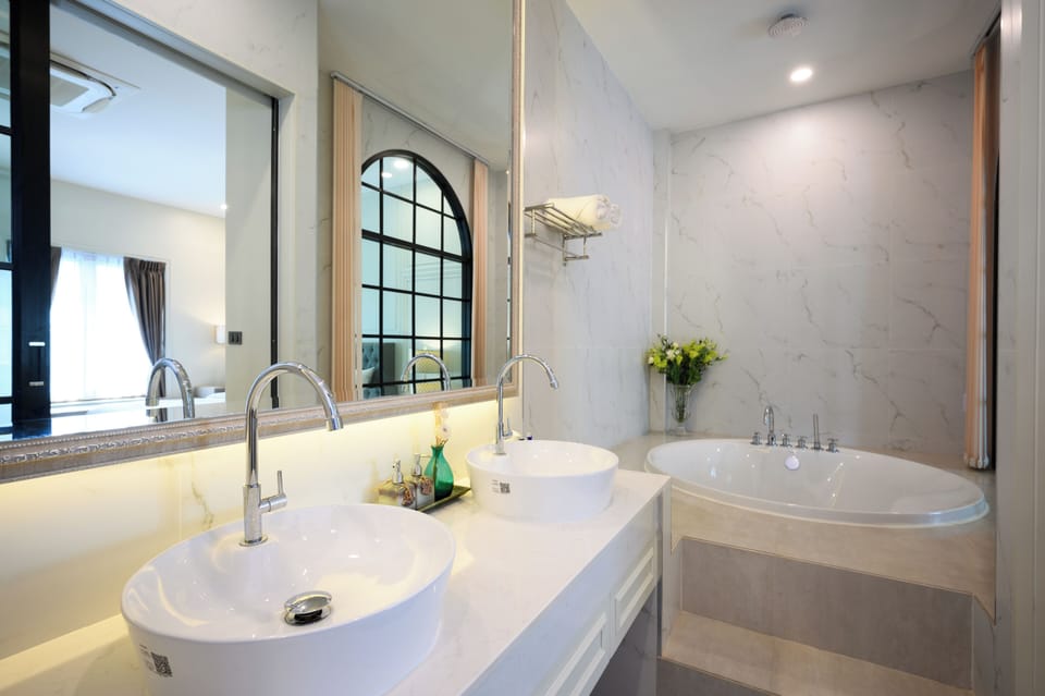 1 Bedroom Pool Villa | Bathroom | Separate tub and shower, deep soaking tub, rainfall showerhead