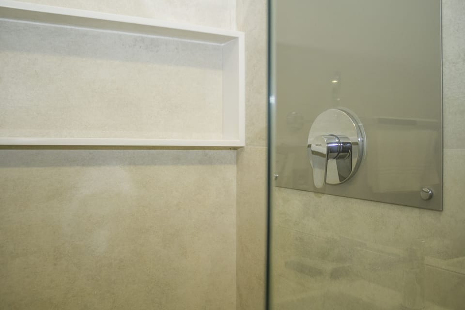 Shower, free toiletries, hair dryer, towels