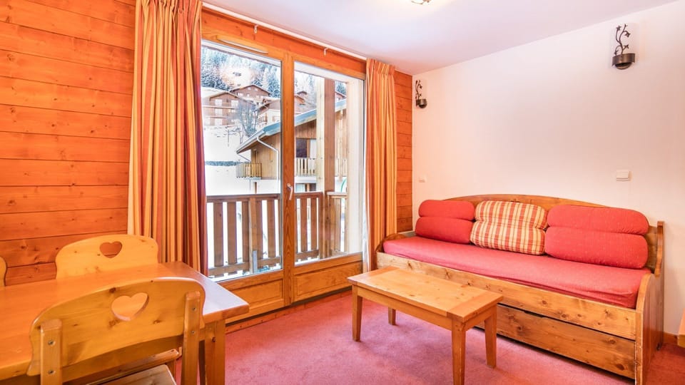 Sit back and relax in the cozy and open living area after a day outside.