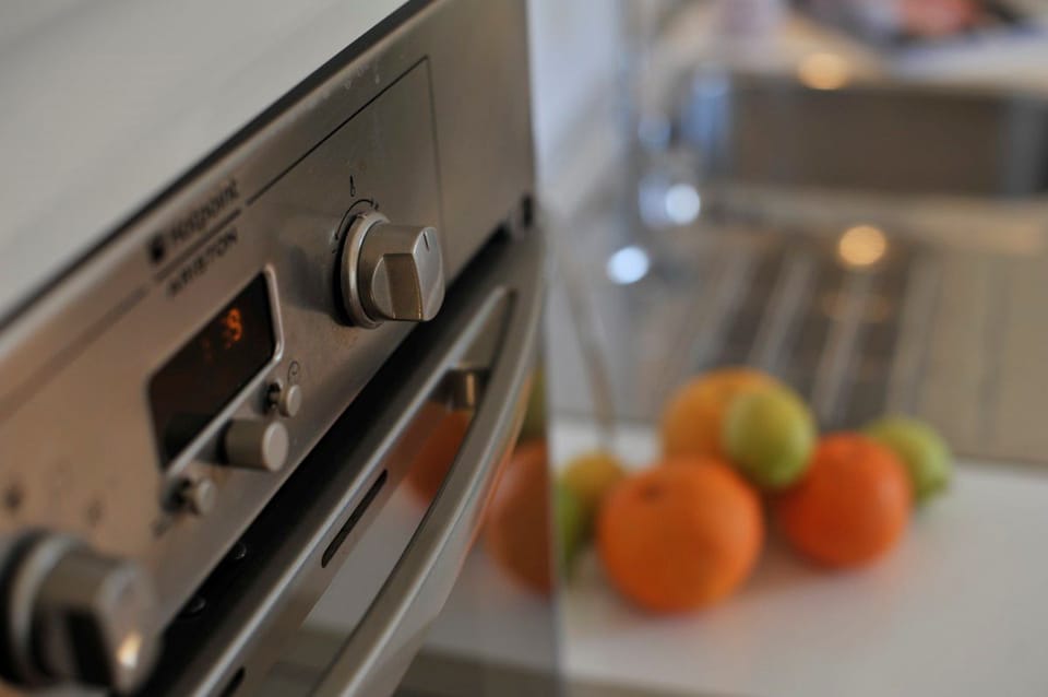 Apartment, 4 Bedrooms | Private kitchen | Fridge, microwave, oven, stovetop
