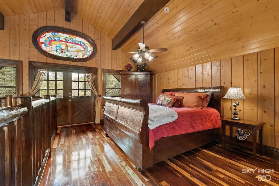 Wake up to the light streaming through the stained glass window and the birds singing in the trees outside.