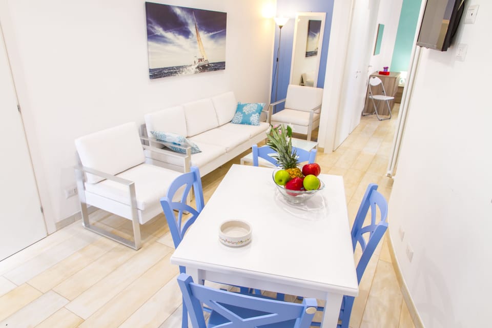 Apartment, 2 Bedrooms | Living area | 16-inch flat-screen TV with digital channels, TV