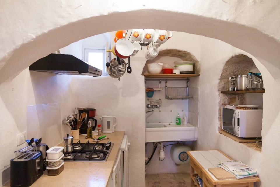 Kitchen - with dishwasher, microwave, fridge and separate freezer.