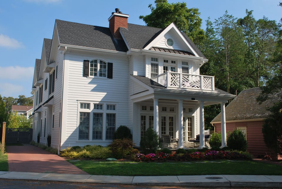 Designer's own unbelievable 9 BR, 10 BA lakefront residence only one block to the beach and boardwalk.  Front porch, balcony, living room and 2 master bedrooms all front Silver Lake.