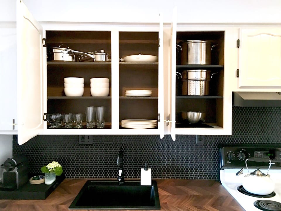 The Kitchen is Stocked with All Cooking Utensils and Flatware