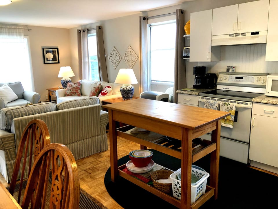 Kitchen, butcher block island and lots of kitchen amenities