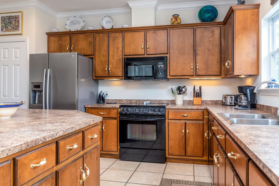 Create delicious meals in your fully equipped kitchen, complete with stainless appliances and everything needed for memorable meals.