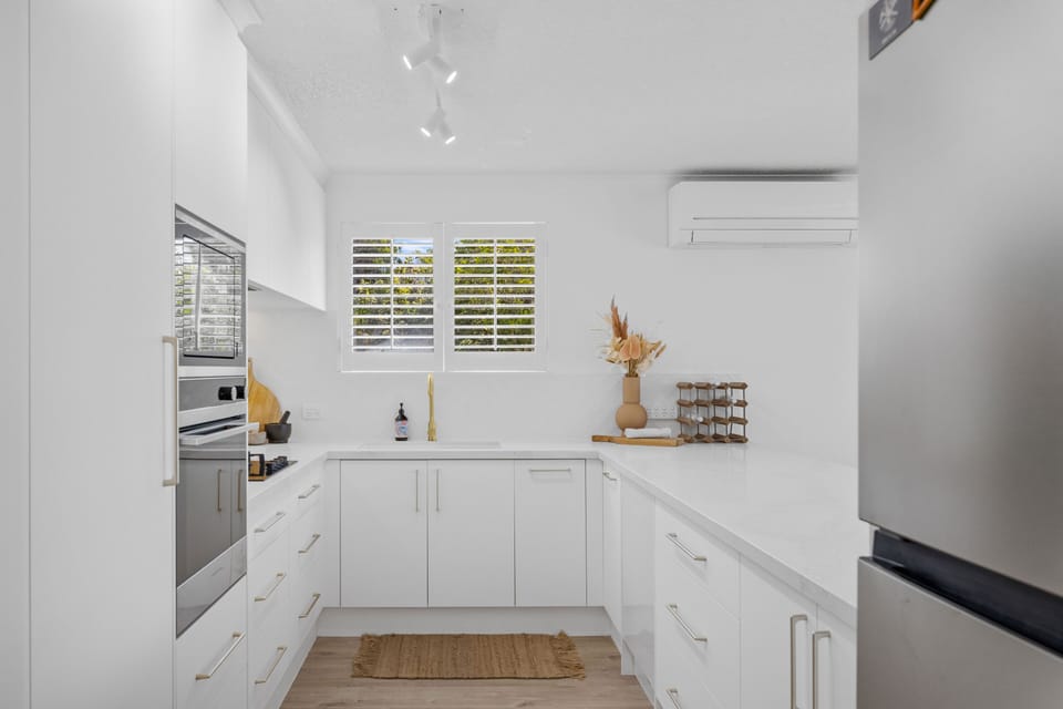 Brand new coastal style kitchen with all cooking equipment supplied