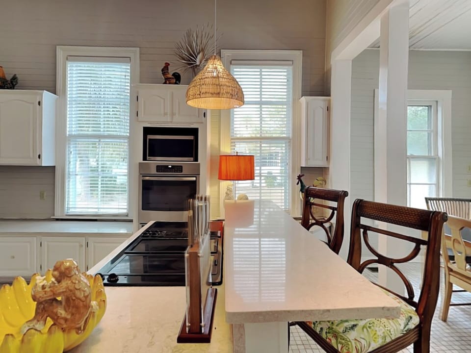 Kitchen w/ Elevated Bar Counter and Seating