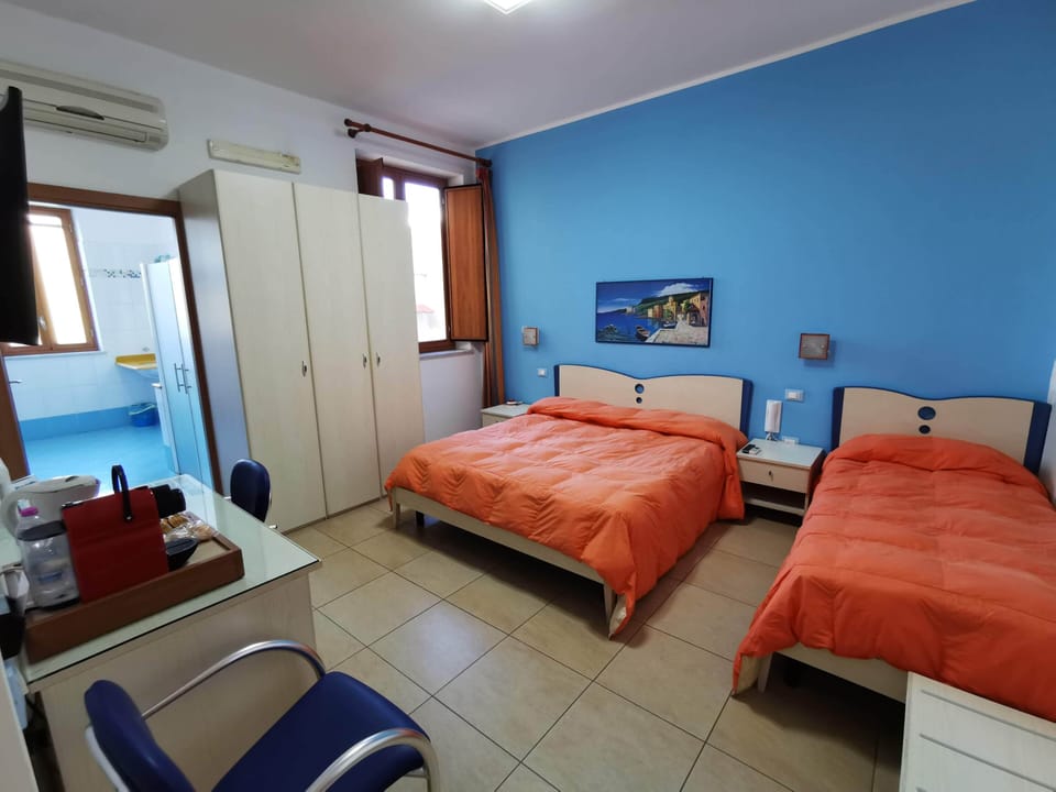 Triple Room | In-room safe, desk, iron/ironing board, free cribs/infant beds