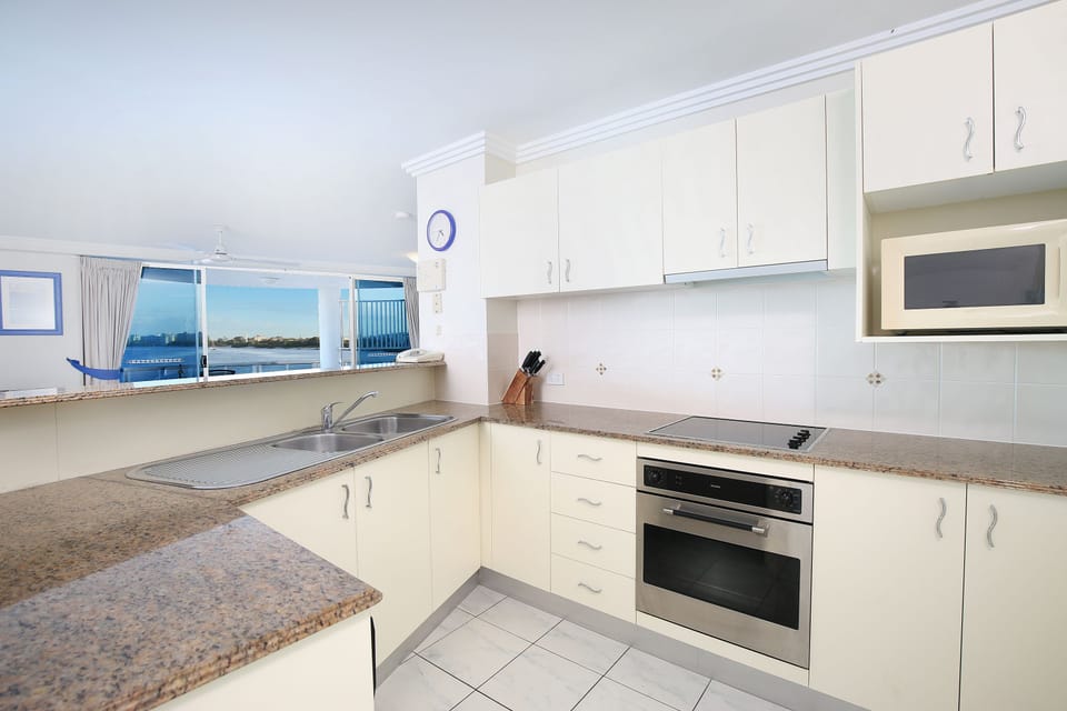 Absolute Waterfront 3 Bedroom Apartment | Private kitchen | Fridge, microwave, electric kettle, highchair