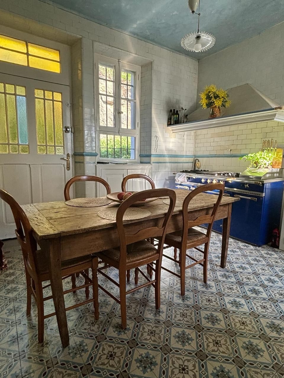 Kitchen with original tiling and laconche stove
