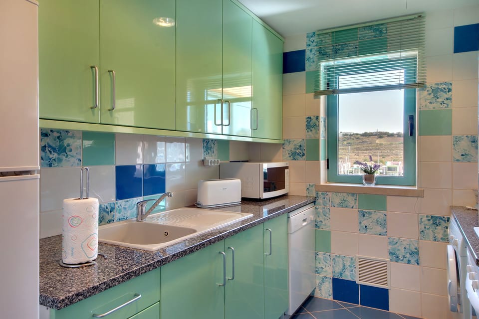Apartment, 1 Bedroom, Balcony, Marina View | Private kitchen | Espresso maker, fridge, microwave, oven