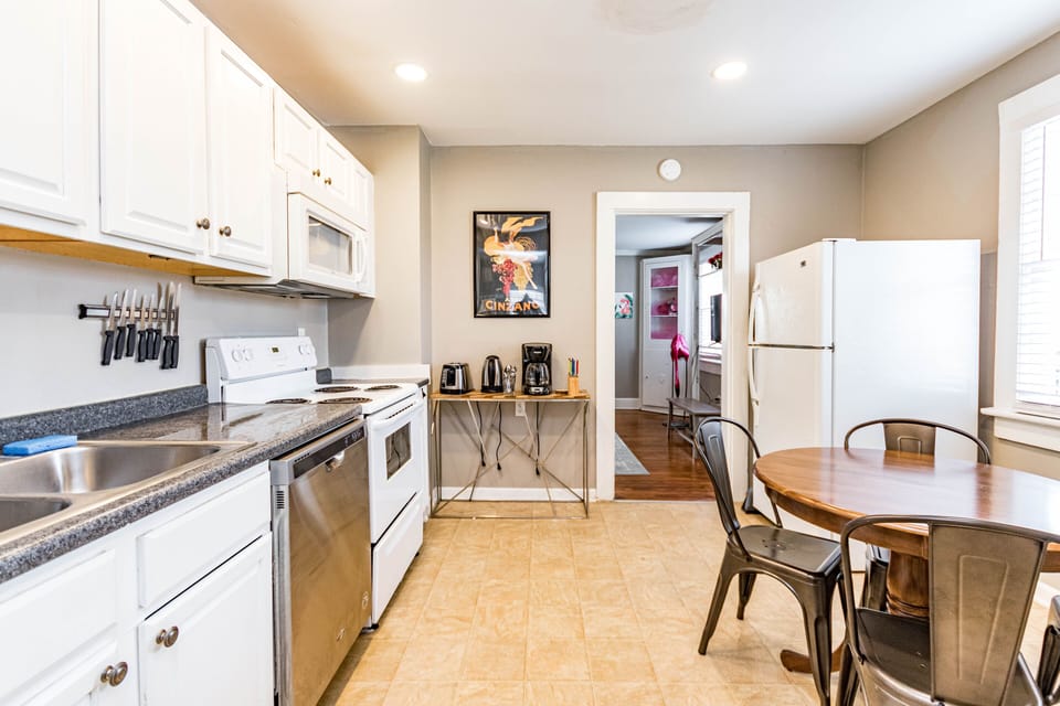 Eat in kitchen with kitchen essentials! Dining room seats an additional 6.
