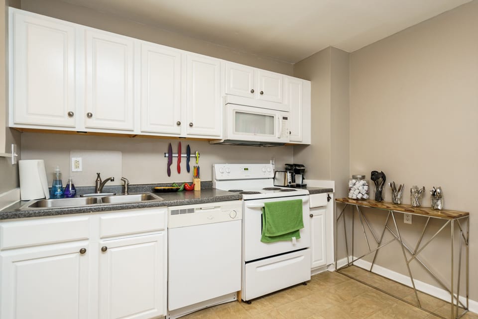 Full kitchen with all the kitchen essentials, including coffee maker, microwave