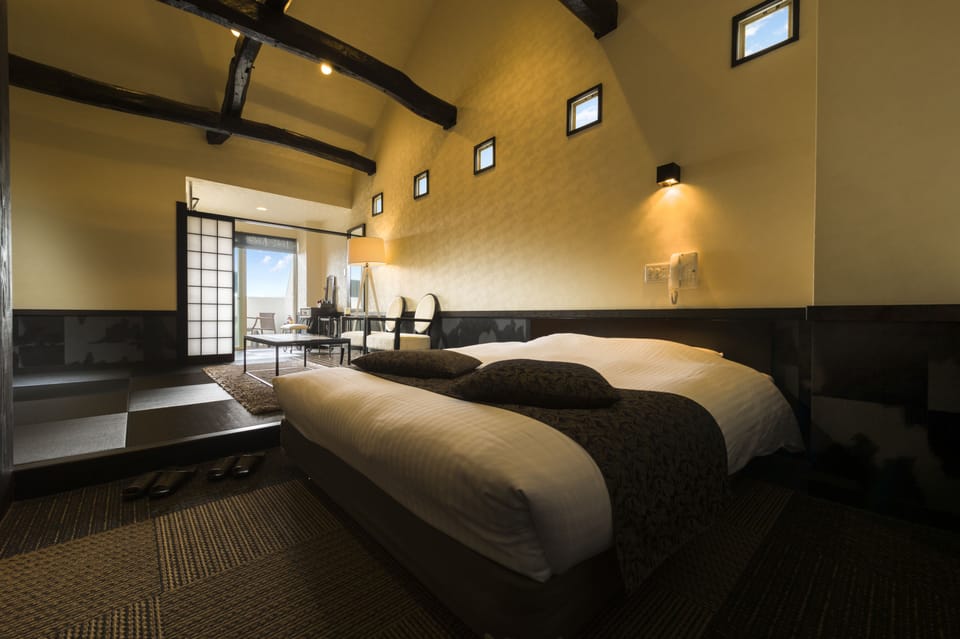 Japanese Western Style Room with Private Open-air Bath, Ocean View | Down comforters, in-room safe, free WiFi, bed sheets