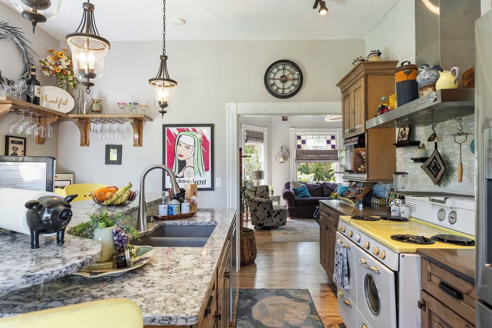 The party blends & flows easily between the living room & kitchen.