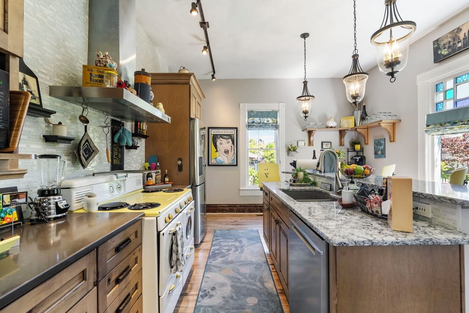 Fully stocked kitchen. Gobs of pots, pans, appliances, service ware & staples.