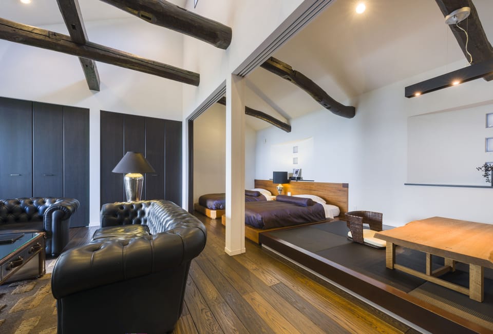 Japanese Western Style Room with Private Open-air Bath, Ocean View  | Living area | Flat-screen TV